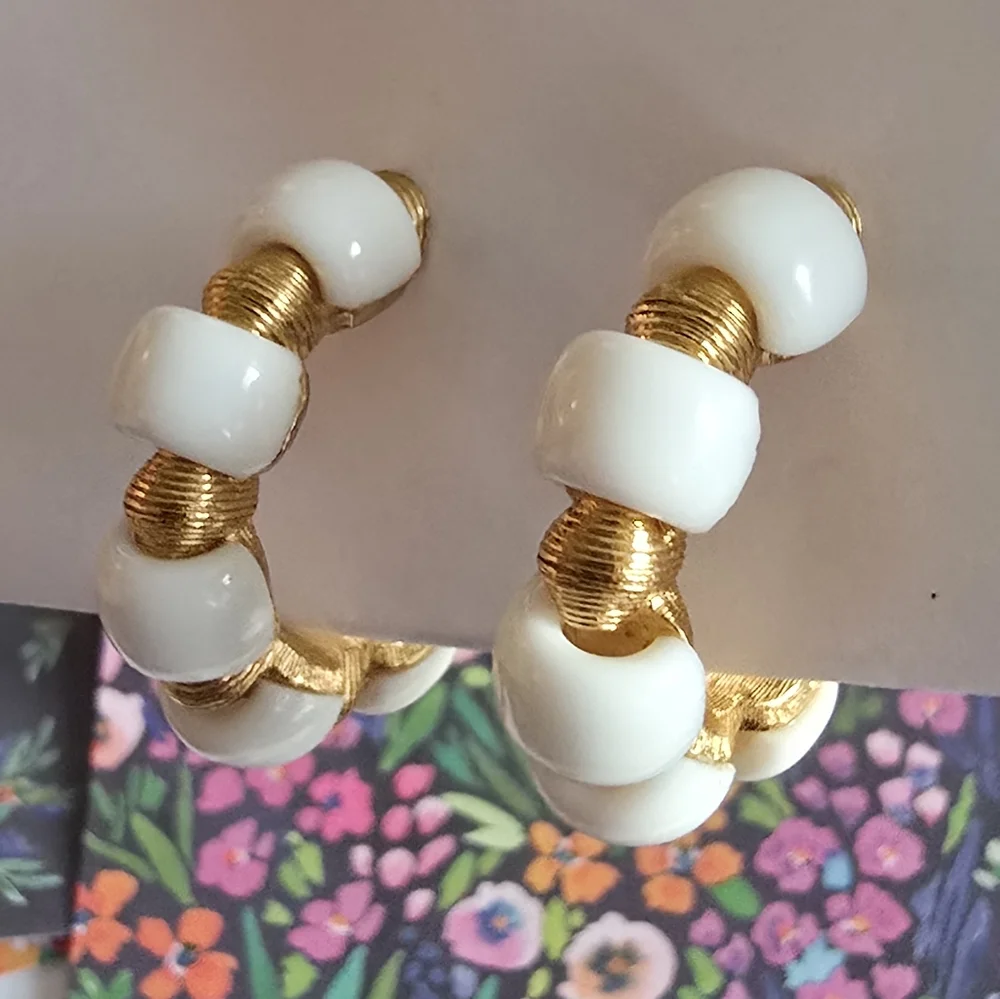 Vintage Trifari earrings Crown hoop white plastic gold tone metal clip on